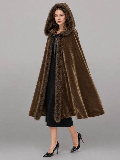 Brown hooded cape with plush faux-fur edging and front tie, shown full-body on a model
