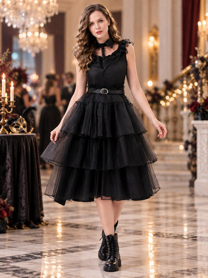 Black sleeveless dress with ruffles and a tiered skirt
