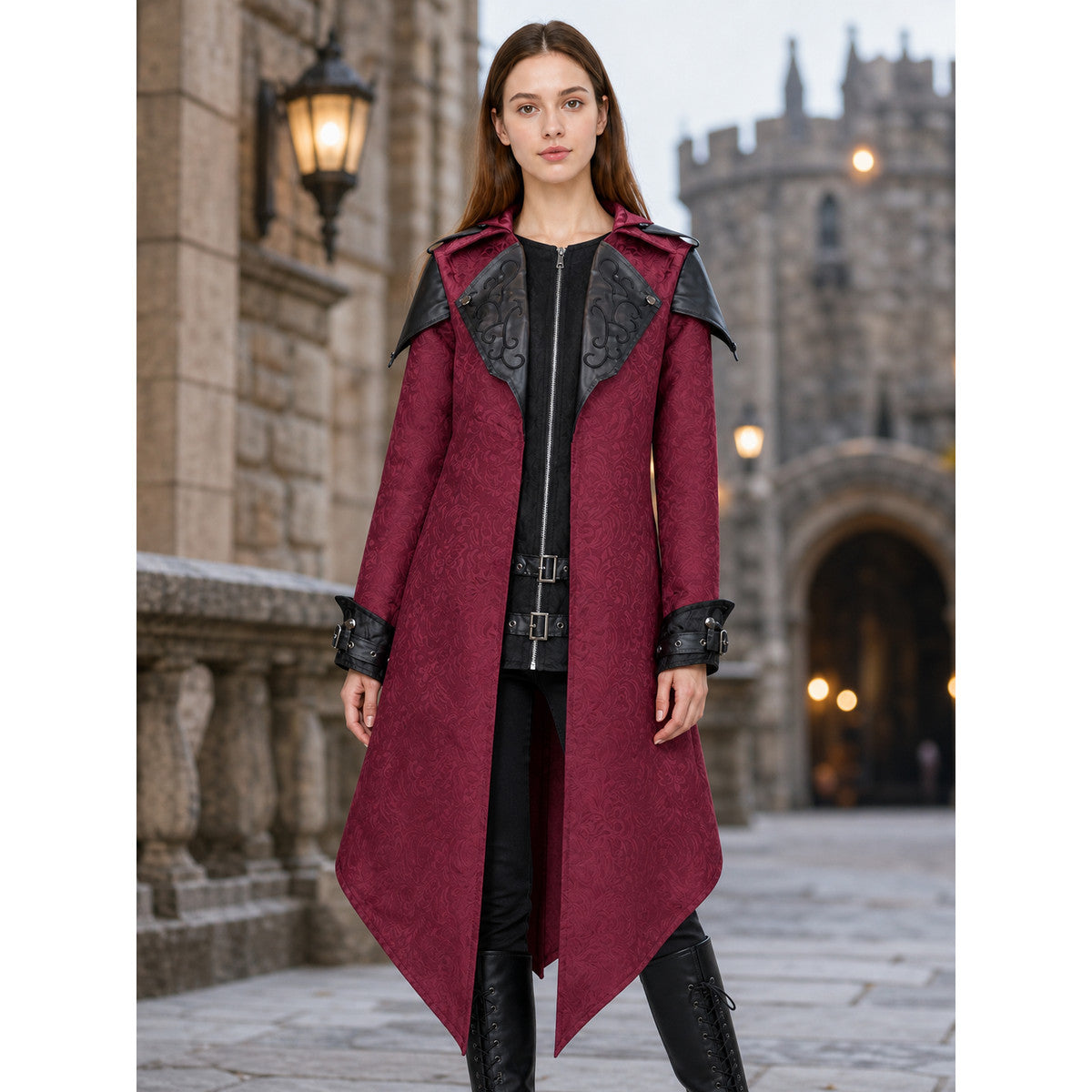 Black long gothic fantasy-style coat with decorative details, a high collar, and an asymmetrical pointed hem. The design features long sleeves and a front zipper closure. Decorative buckle straps are positioned at the waist and cuffs, while