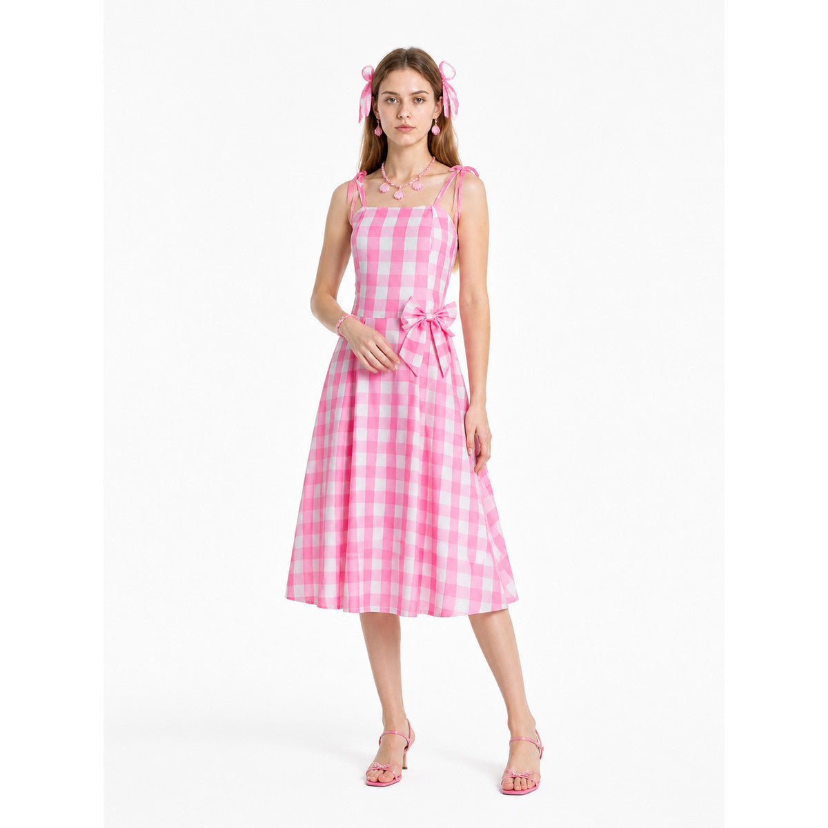 Pink-and-white gingham pinafore dress with a bow Costume Dresses detail