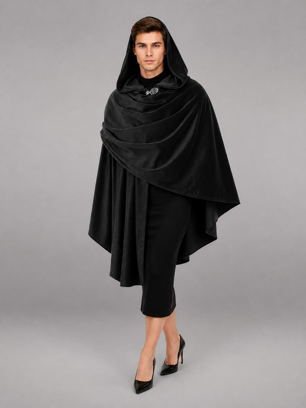 Black hooded cloak with wide draped front and clasp, shown full-body on a model with black clothing