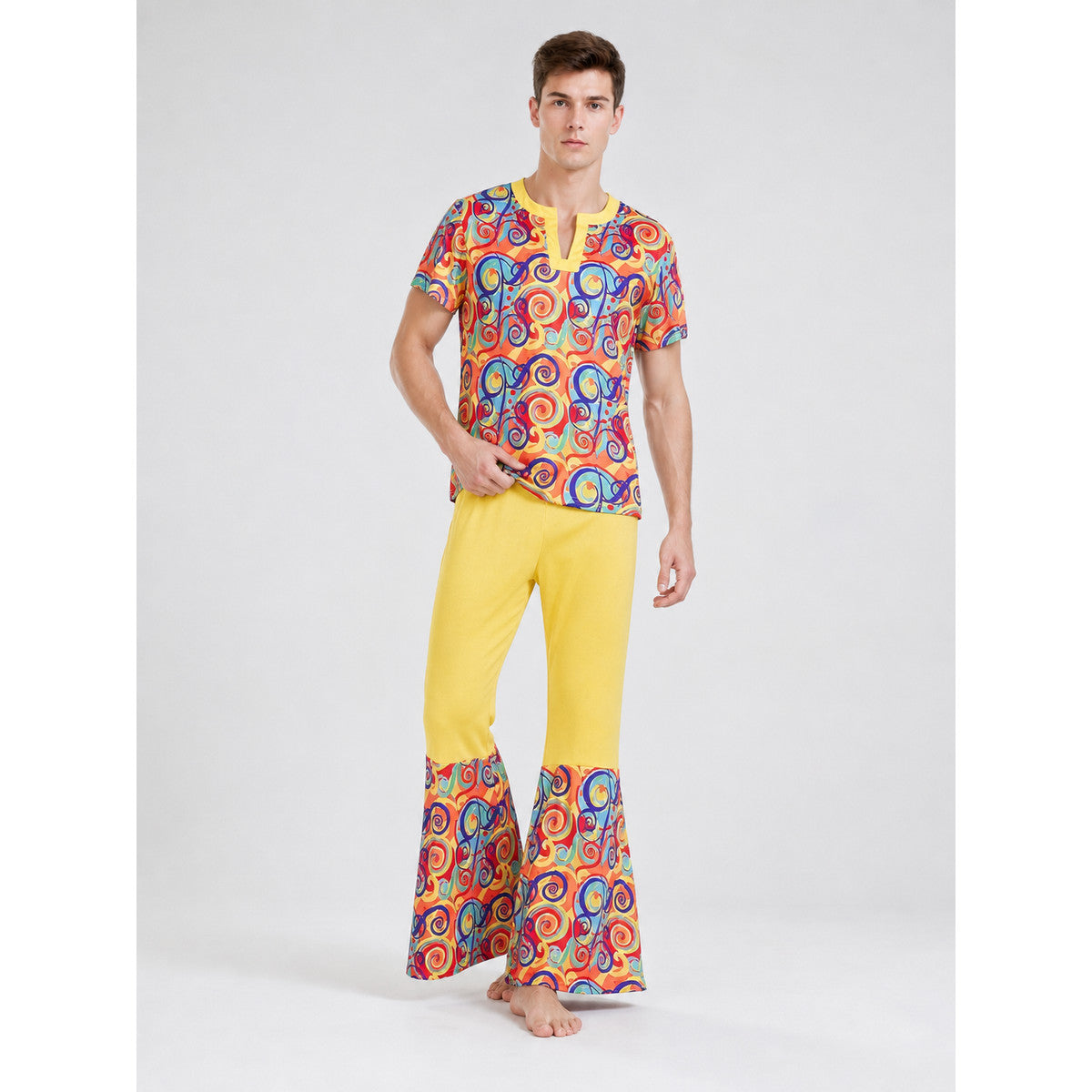 Bright 1970s Disco-Style Costume for Themed Events. The set includes a short-sleeve top, yellow flared pants, and a matching headband. The top is decorated with a multicolored swirled pattern throughout and features a V-neckline with yellow