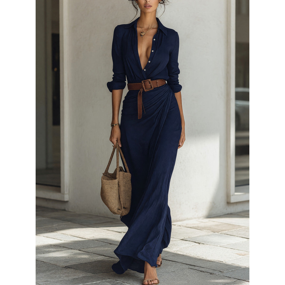 Women's dark navy dress with a belt and long sleeves