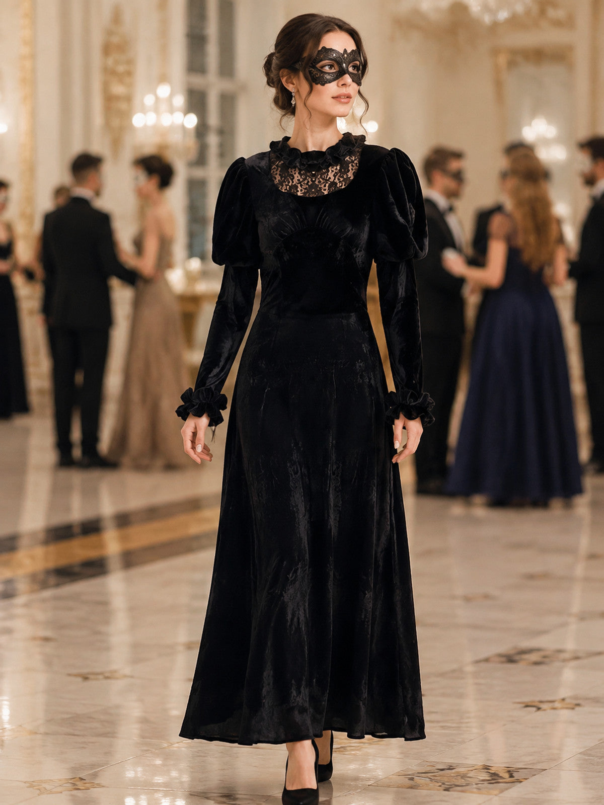 Long black corduroy dress with puff sleeves lifestyle view