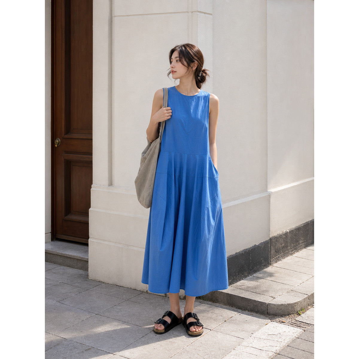 Women's Blue Sleeveless Midi Dress with Pockets lifestyle