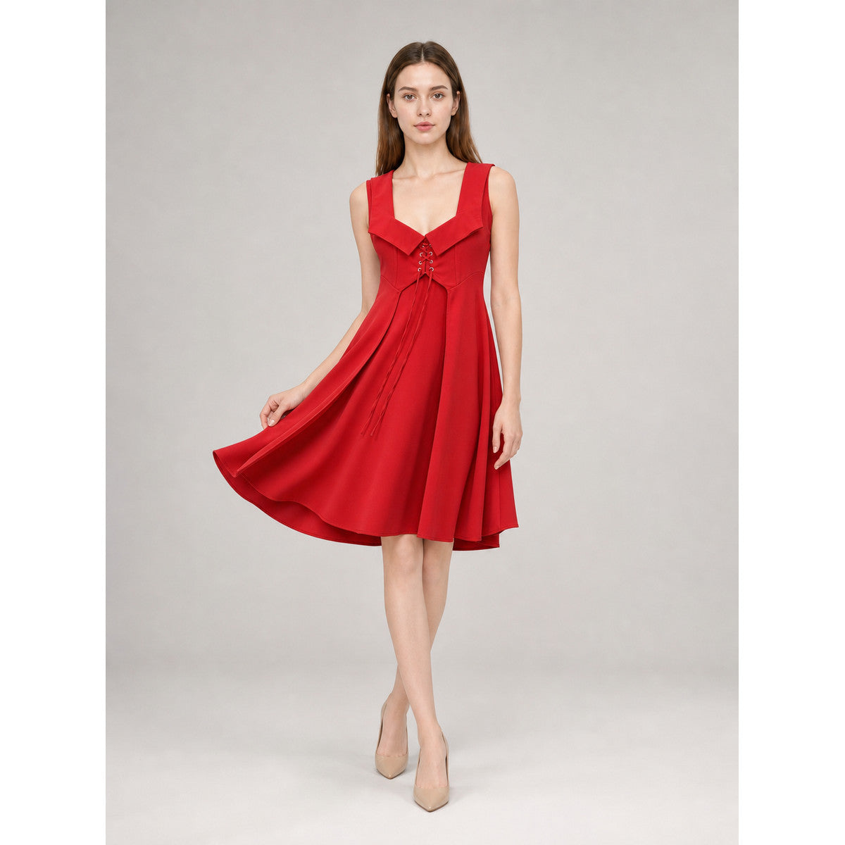 The red dress is designed in a vintage corset style and is suitable for costume events, themed parties, stage performances, and special occasions. The sleeveless design features a wide rounded neckline and a fitted bodice with structured pa
