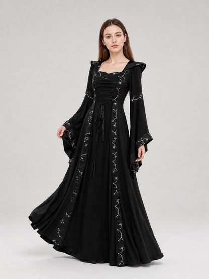 The dress is designed in a Gothic style with elements of Victorian aesthetics.