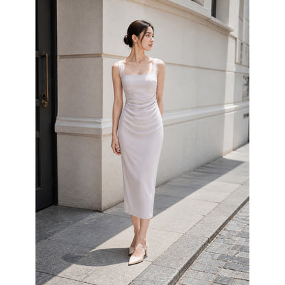 Women's fitted midi dress with thin straps and draping