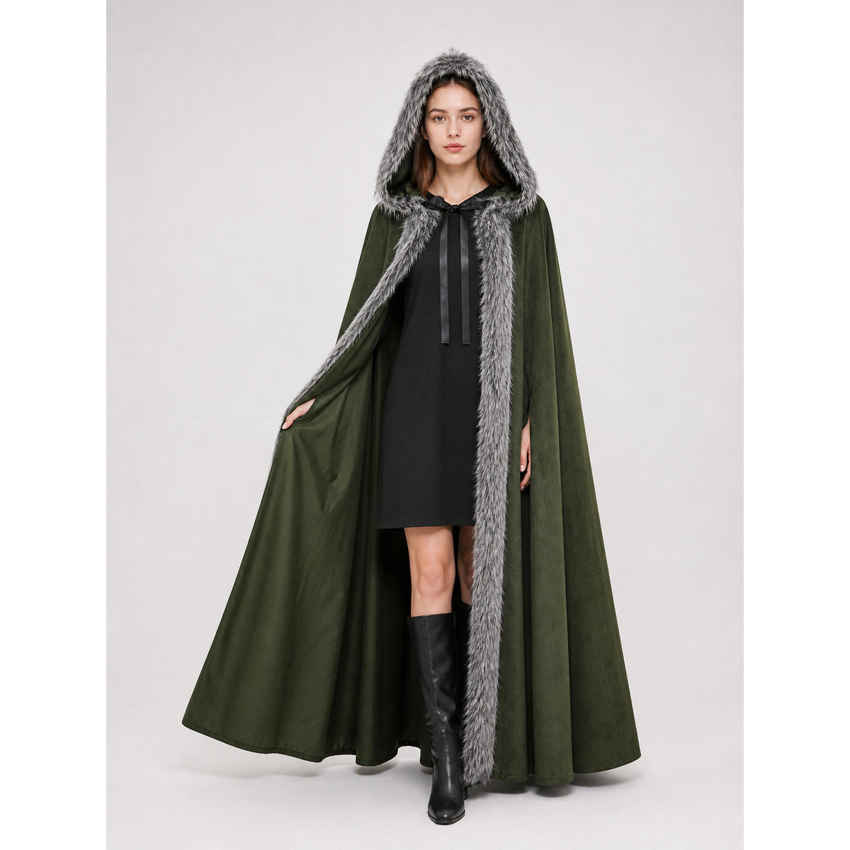 Green hooded cloak with gray fur trim, shown full-length as a model lifts the open side