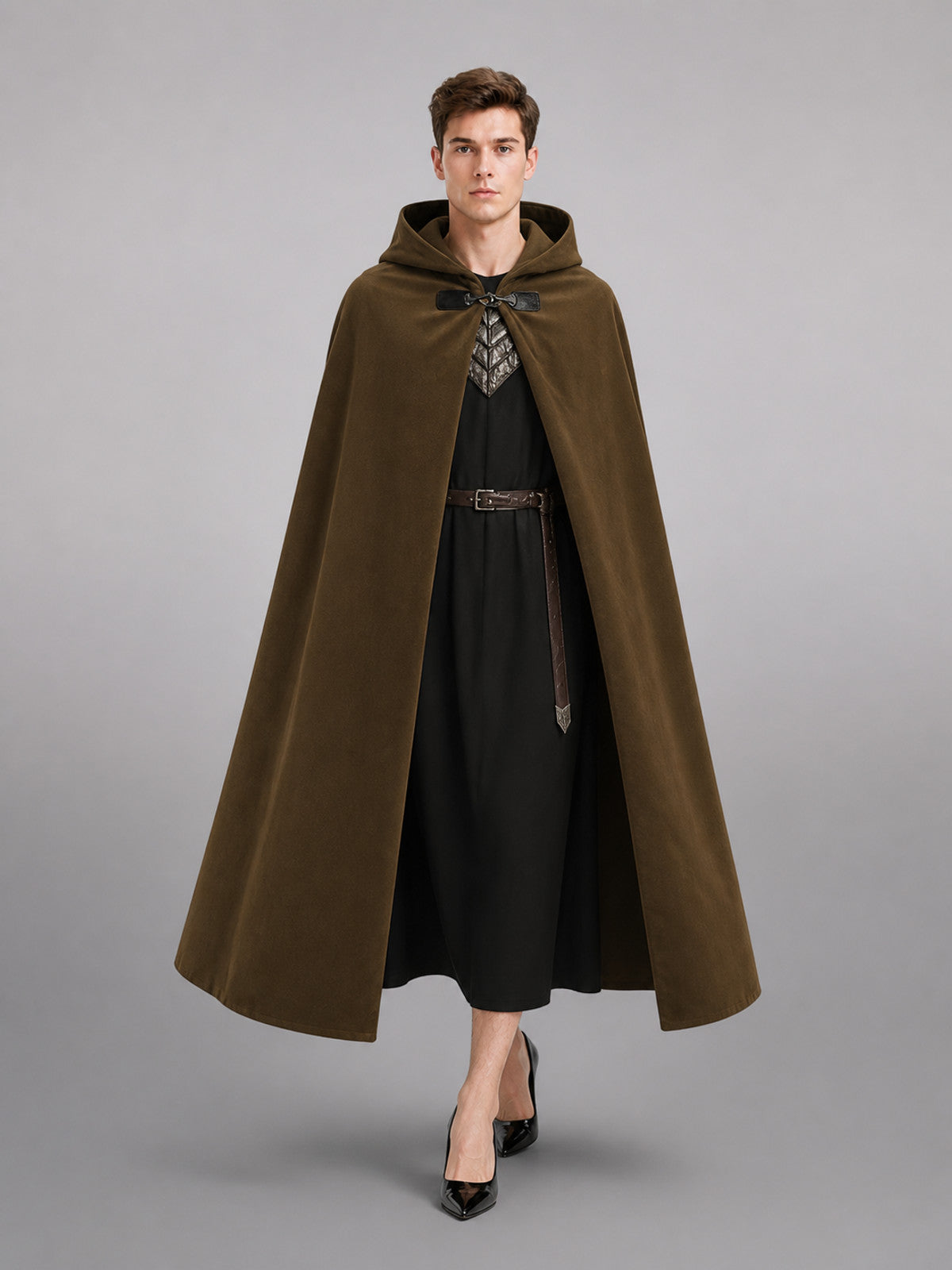 Olive hooded cloak with a metal clasp and open front, shown full-body on a model wearing a black outfit