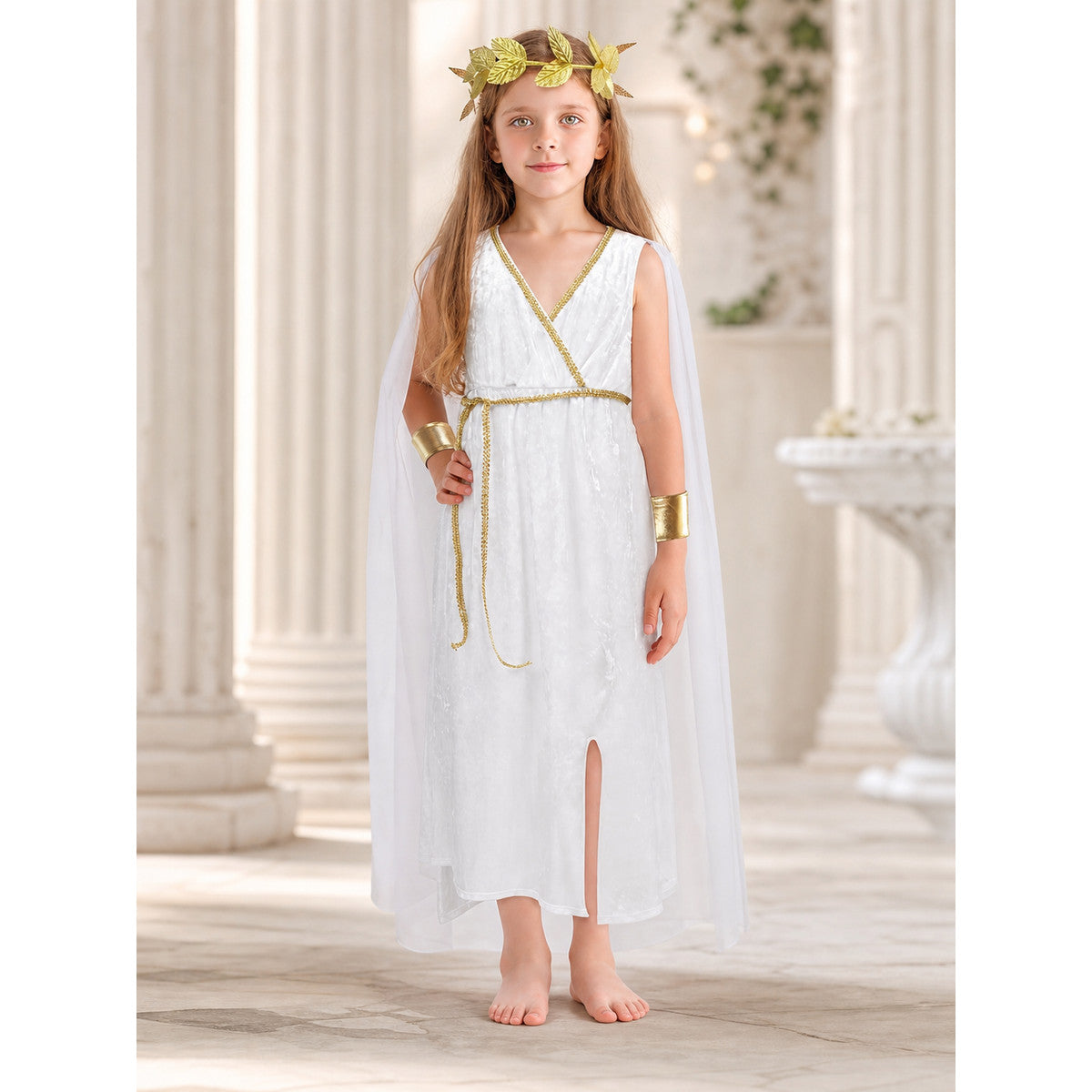 Girls' Greek goddess costume with sheer white cape and gold laurel headband shown in a classical column setting