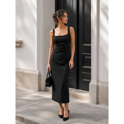 Black midi dress with a square neckline and draping