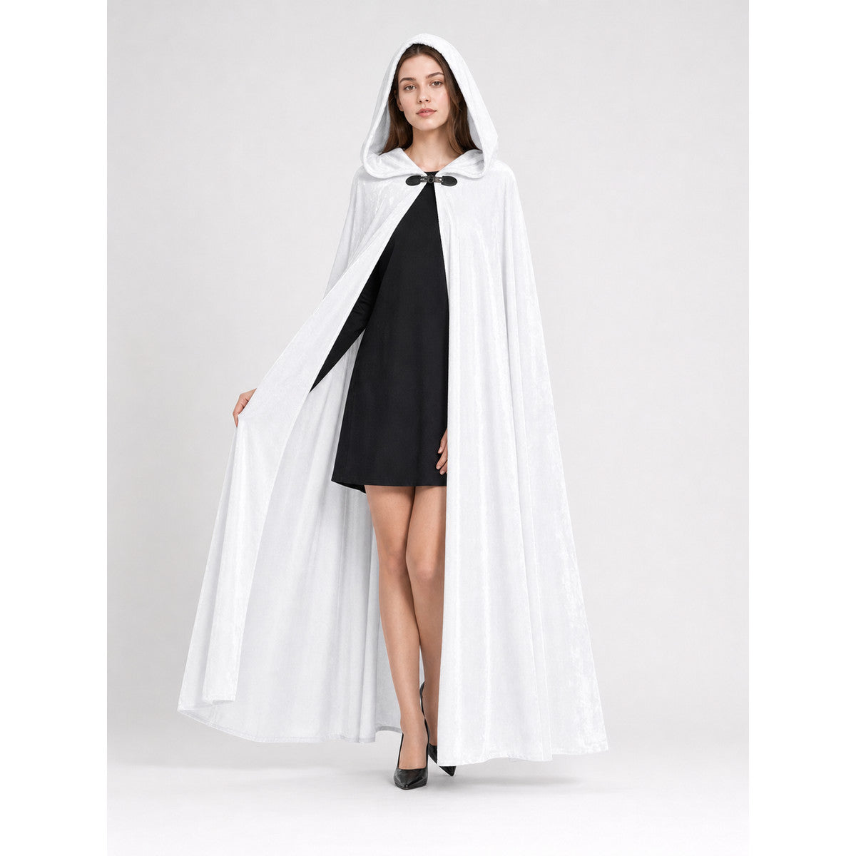 White full-length hooded cape shown open on a model, revealing a black outfit and black front clasp