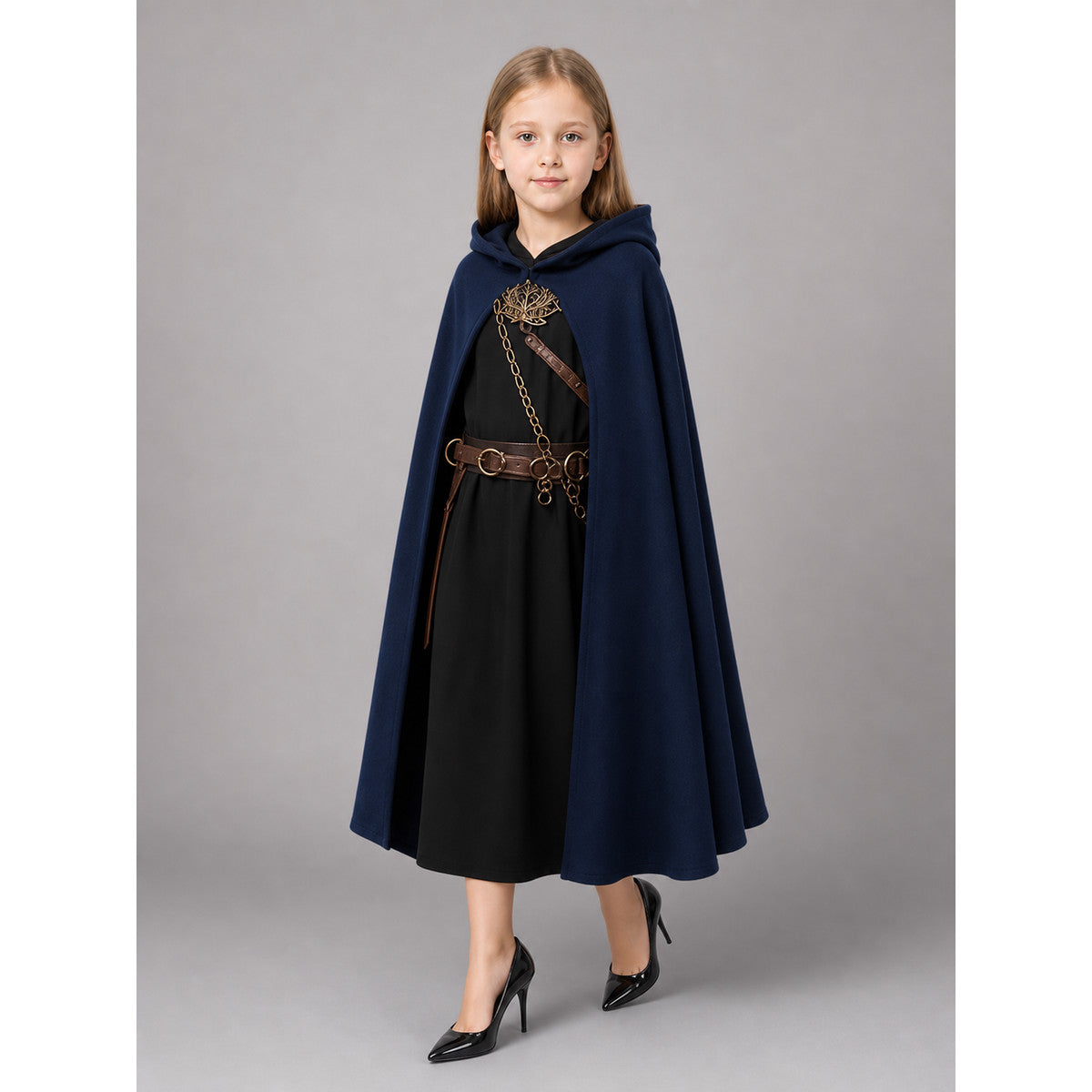 Dark blue hooded cloak shown full-body on a girl, worn open over a black dress with a long flared hem