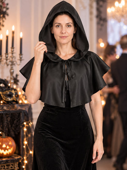 Black hooded cape with no sleeves and ties