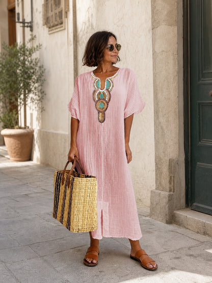 Pink loose-fit midi dress with embroidery and a slit Costume Dresses detail