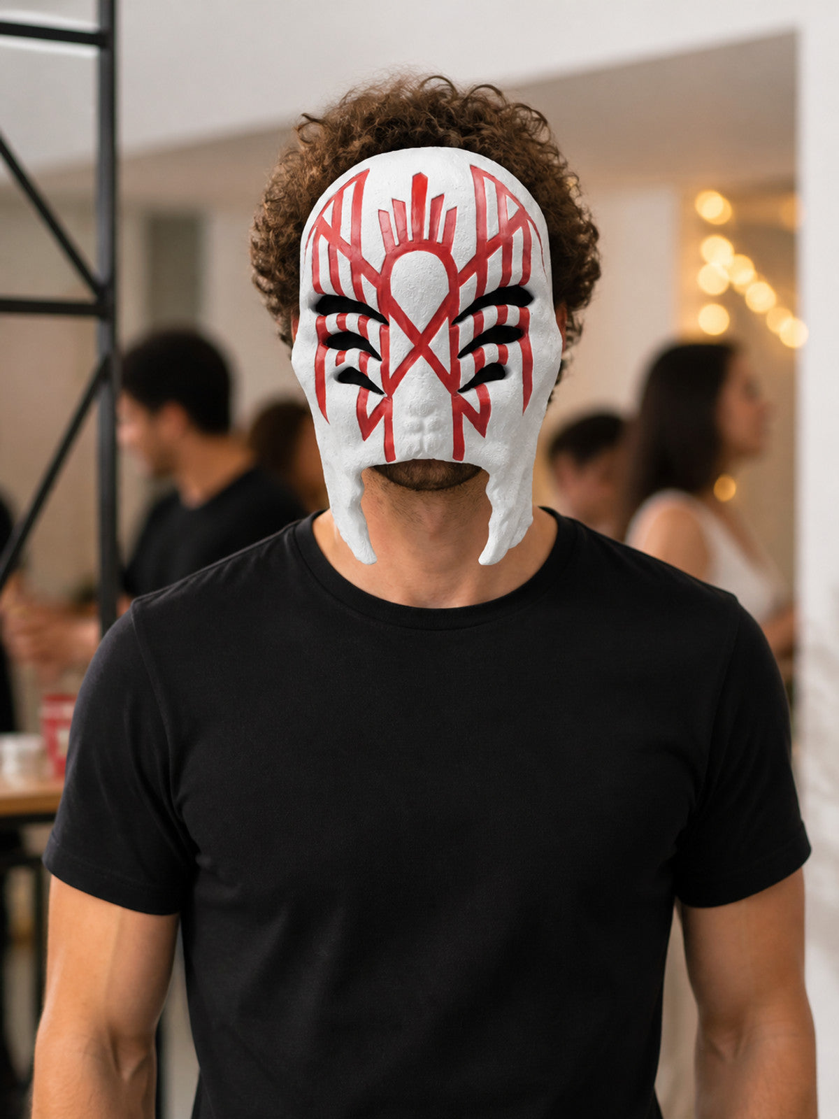 White Carnival Mask with Red-and-Black Pattern lifestyle view