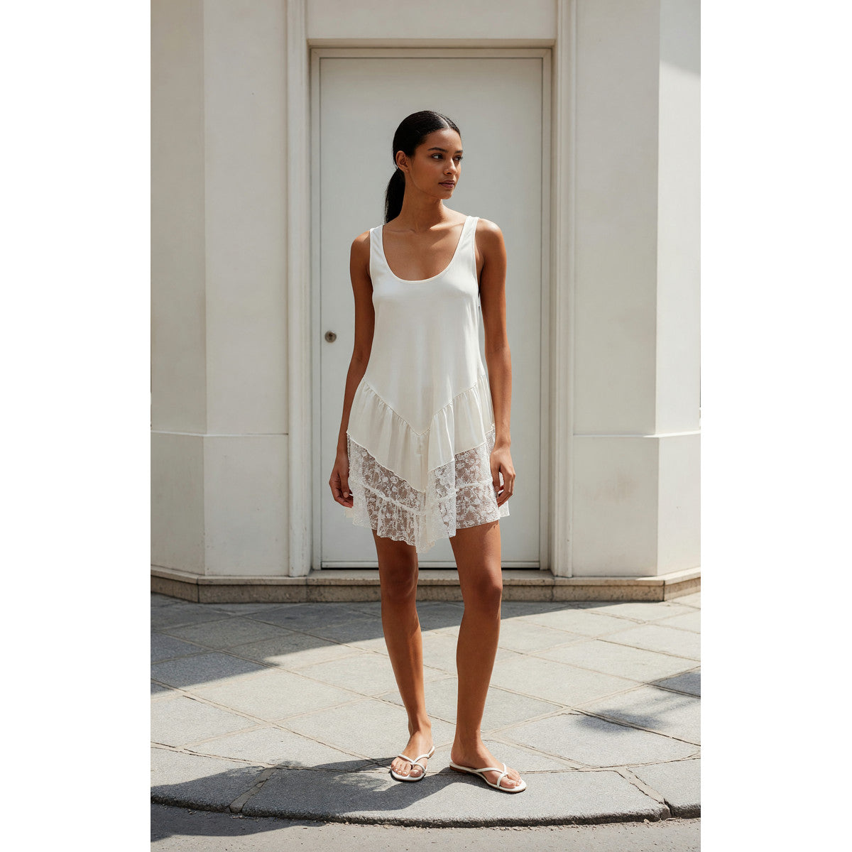 Sleeveless Top with Ruffles and an Asymmetrical Hem lifestyle