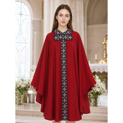 The cape is red with black decorative elements. It has a loose cloak-style silhouette, wide sleeves, and a collar with black patterned detailing. The front features a vertical decorative stripe down the center and a horizontal stripe across