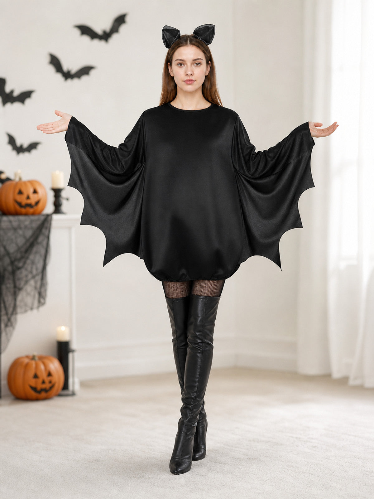 Black bat costume dress with a headband and ears for themed events. The design