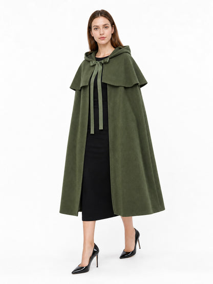 Olive green hooded cloak shown on a model from a three-quarter front view, with layered shoulders and long front ties
