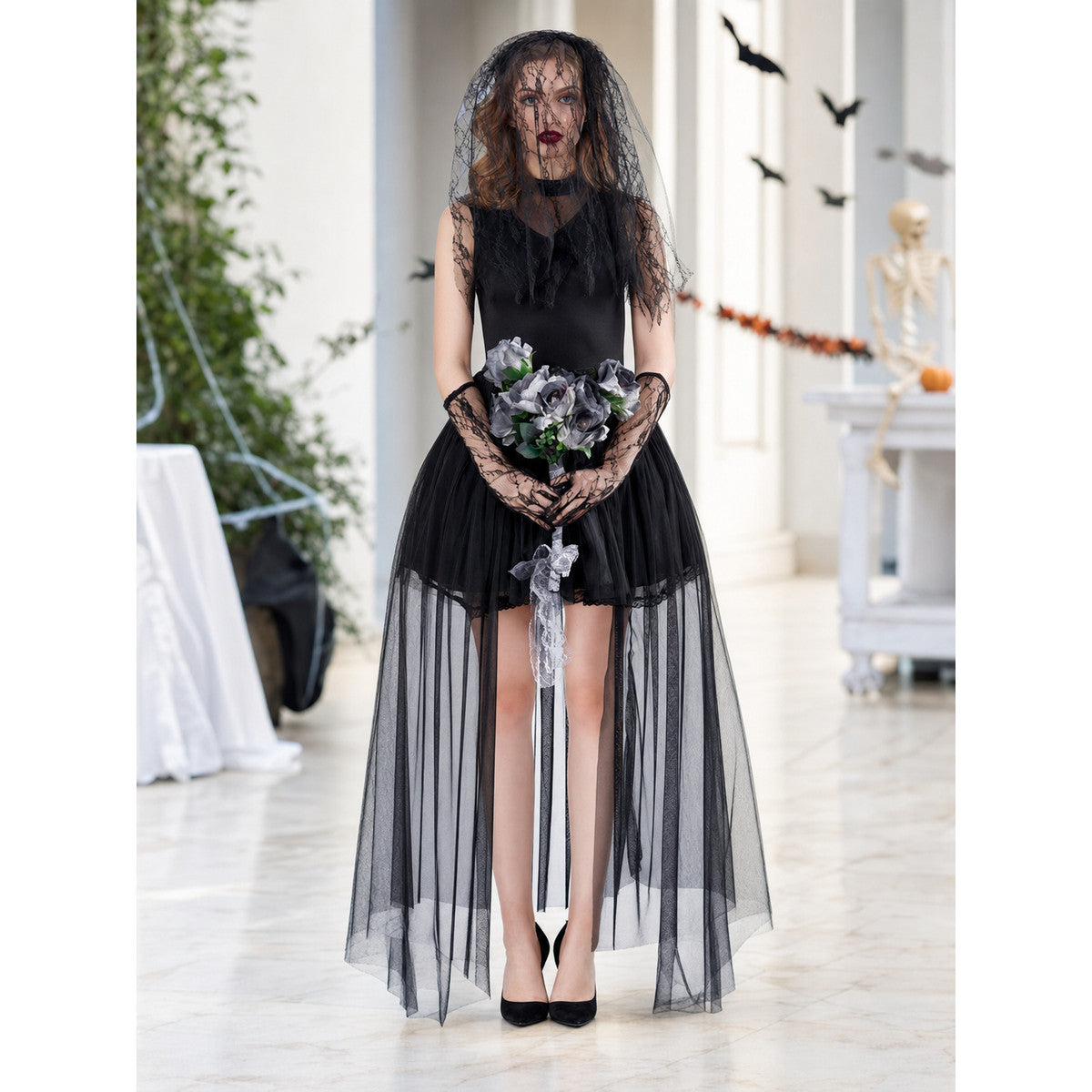 Black gothic zombie bride costume with lace veil and gloves styled in a Halloween party setting