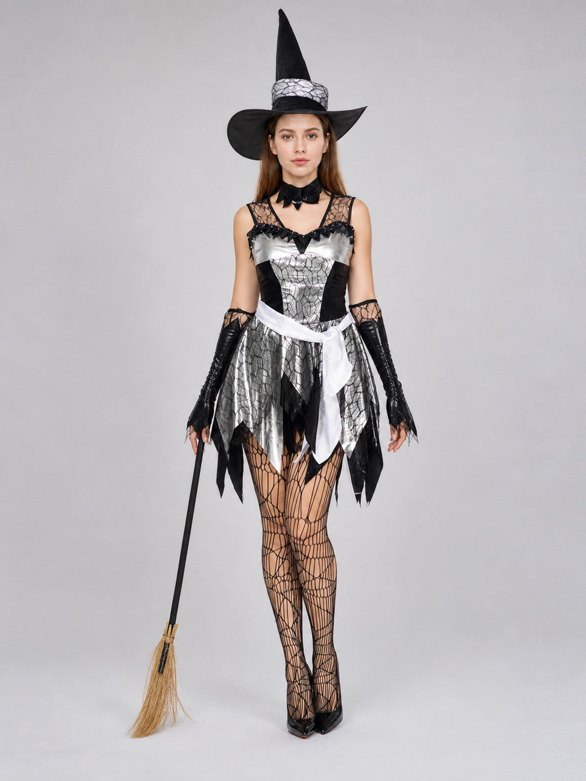 The witch costume is designed in a black, silver, and white color scheme and