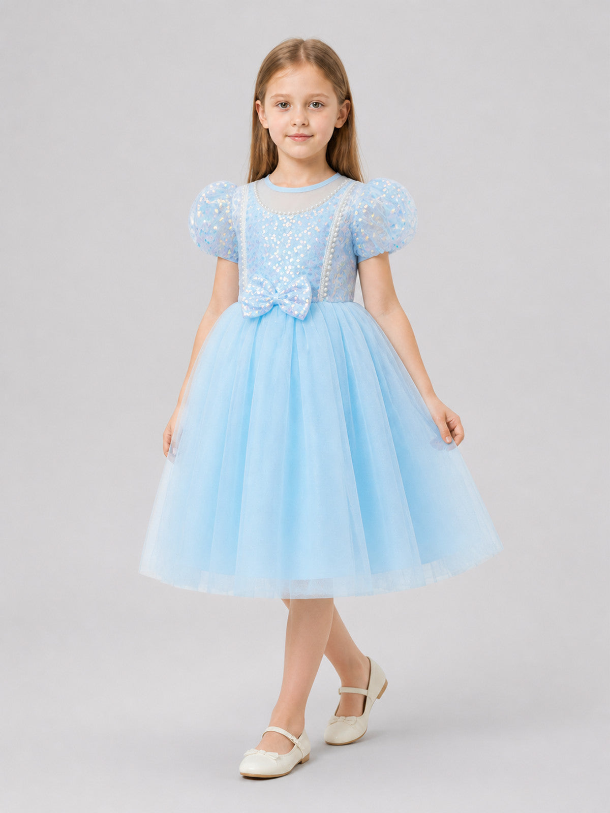 Party Dress with Sequins, a Full Skirt, and a Bow