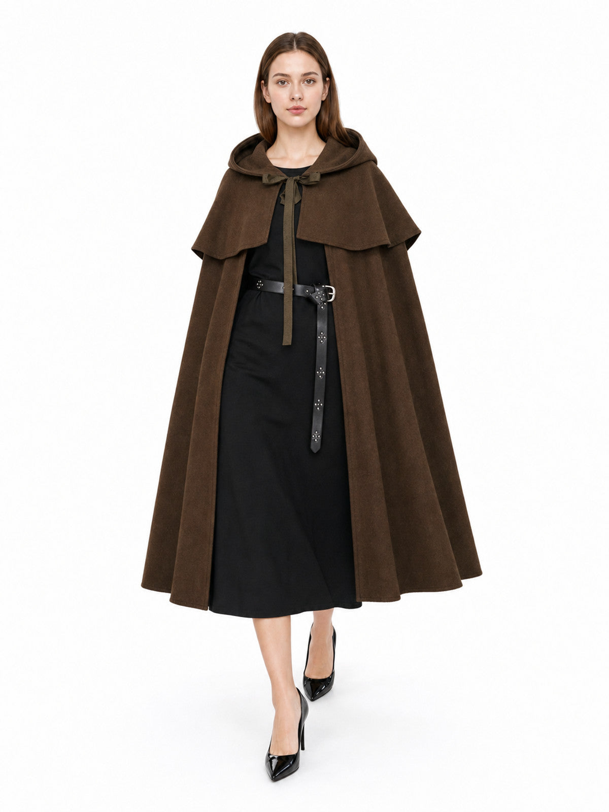 Brown hooded cape with layered shoulder panels and long front ties, shown full-length on a model over black clothing