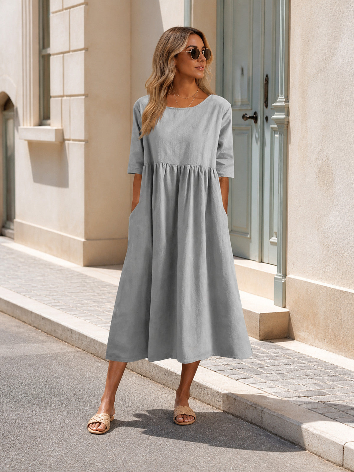 Long Gray Dress with 3/4 Sleeves and an A-Line Silhouette