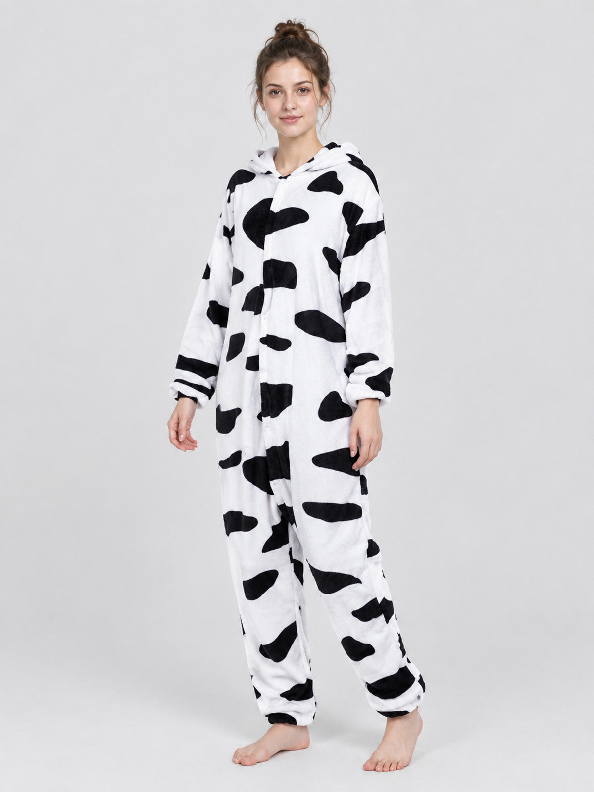 White pajama jumpsuit with black spots and a hood