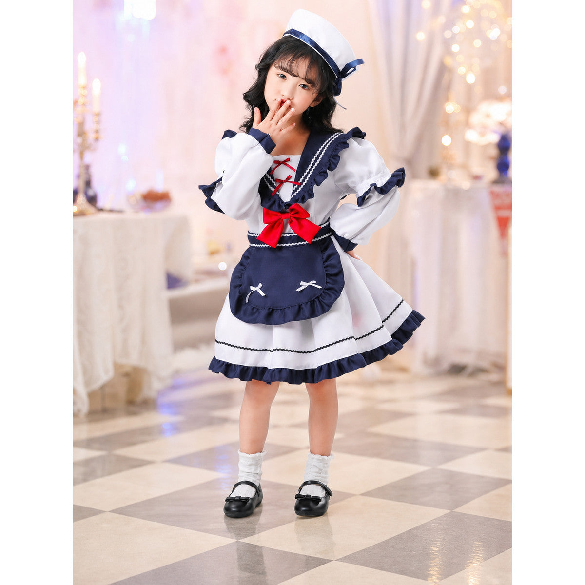 Nautical-style stage costume with bows