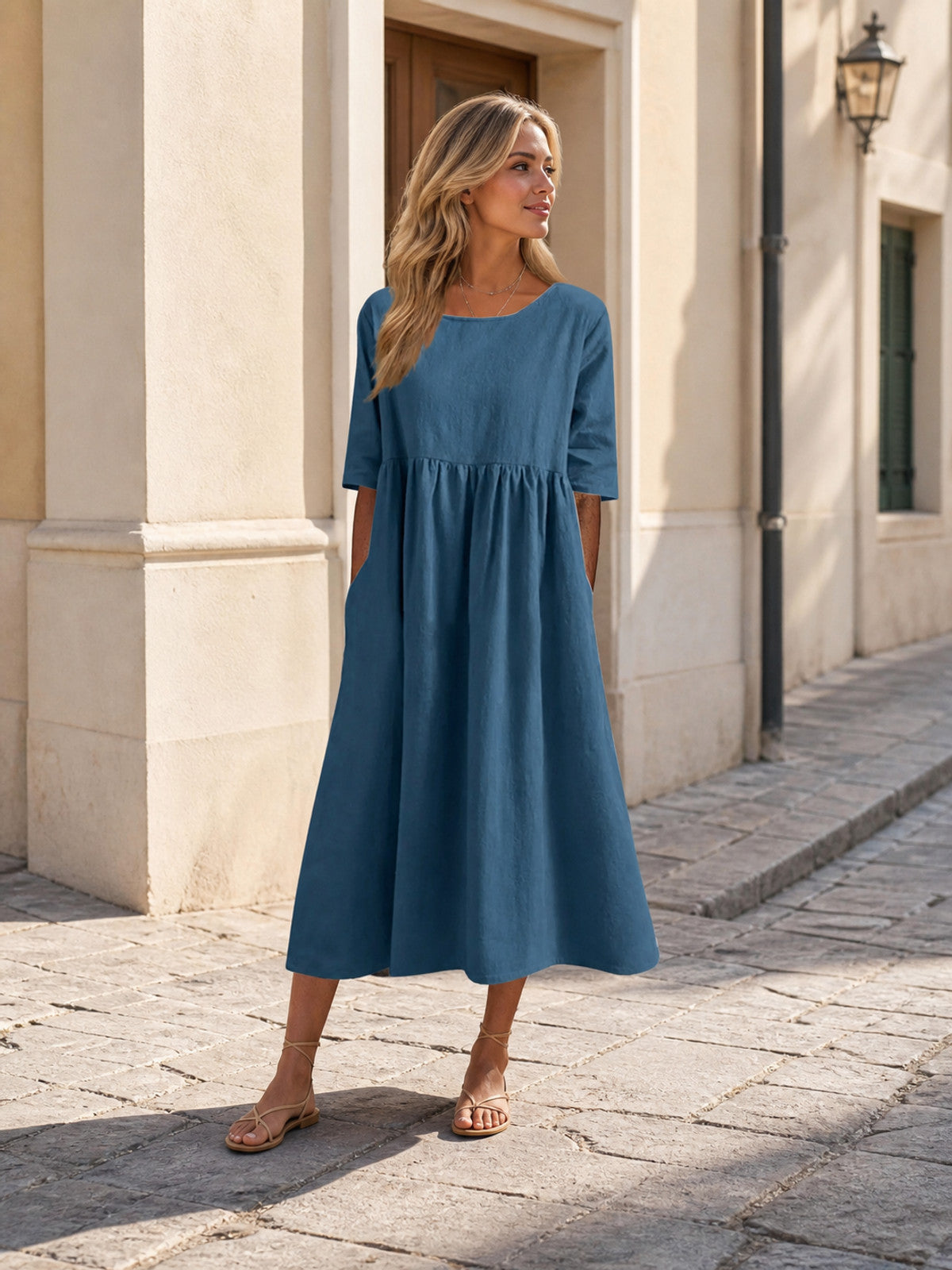 Long A-line dress with a round neckline and pockets