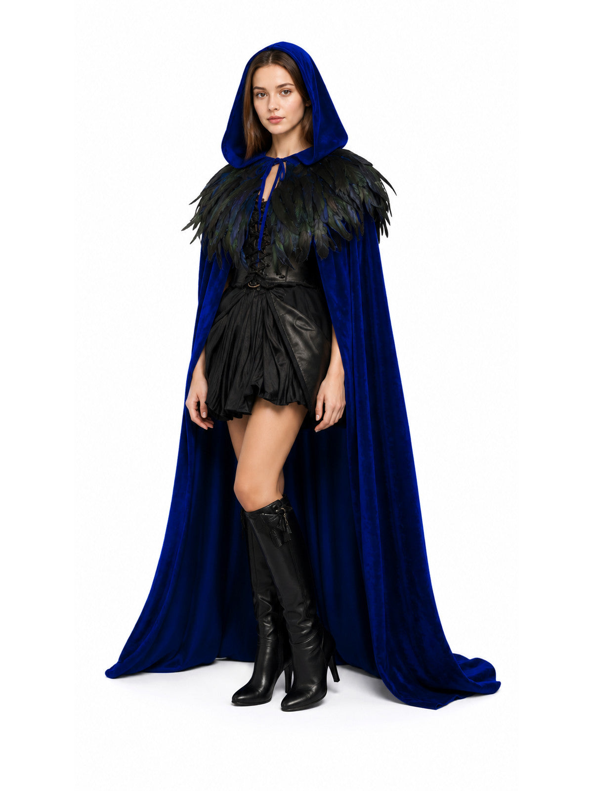 Blue hooded cape with black feather shoulder trim, shown on a model in a three-quarter full-body pose