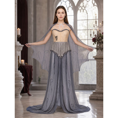 Gothic zombie costume with the sheer bat-wing cape spread open, shown in a candlelit gothic hall