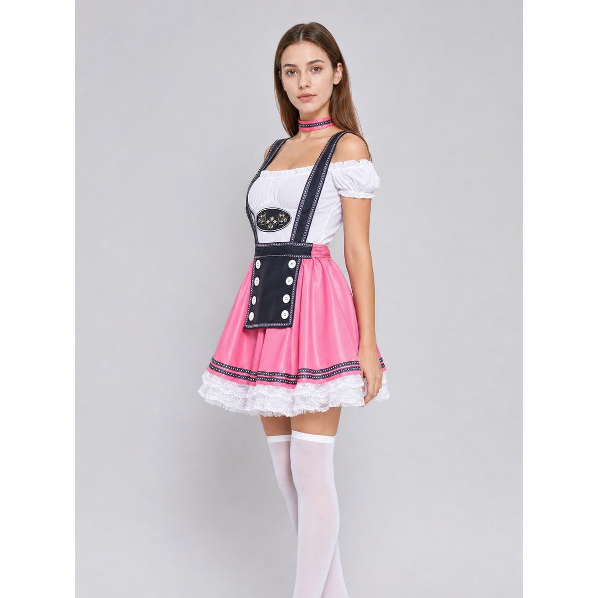 Side view of the women's pink dirndl costume showing the flared skirt with lace hem and black button apron