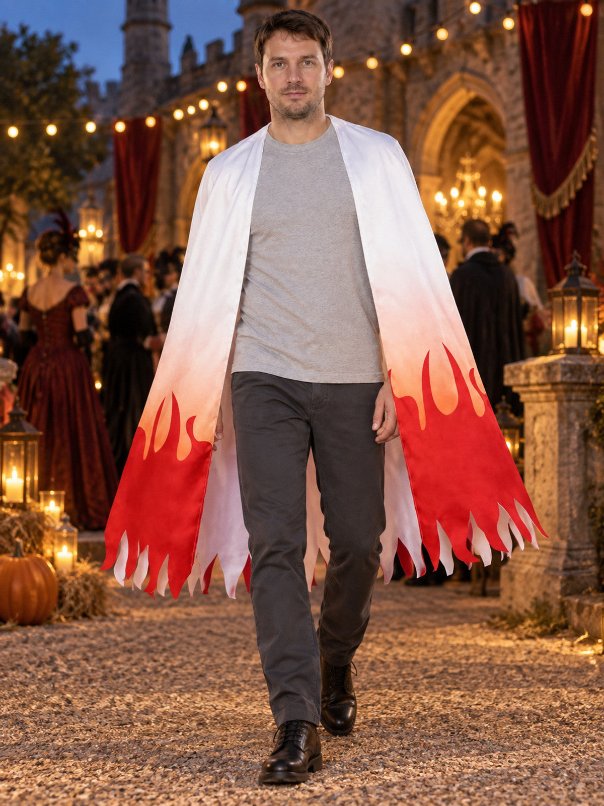 Long sleeveless cape with an open front and a shaped edge, white with red flames