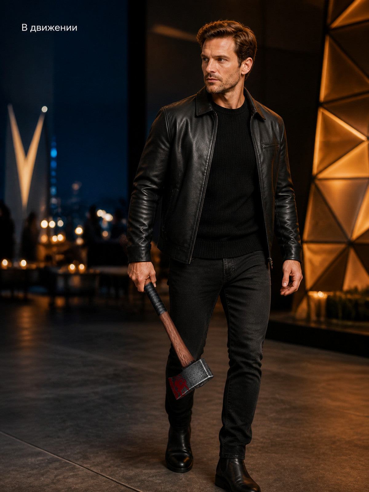 Full-body model walking indoors while holding the axe, showing its wood-look shaft, black grip, and red-patterned metal head