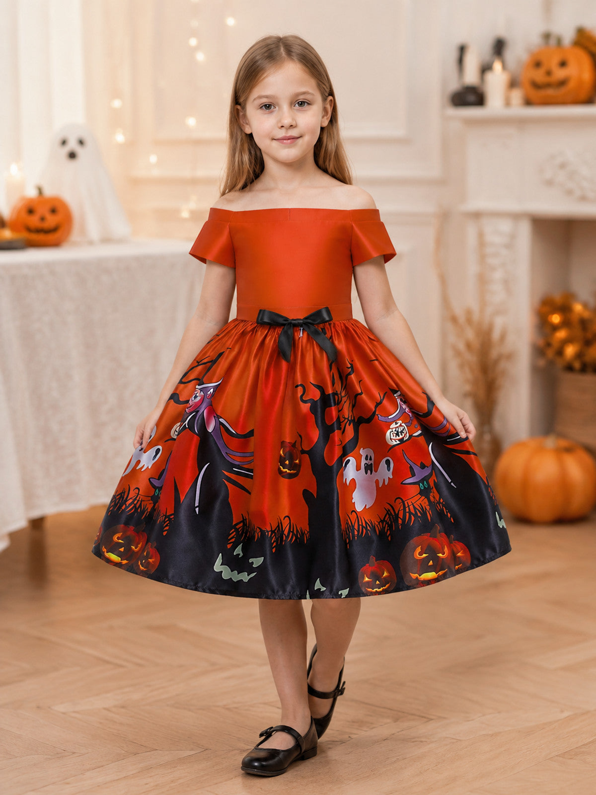 Orange children's dress with a Halloween print lifestyle view
