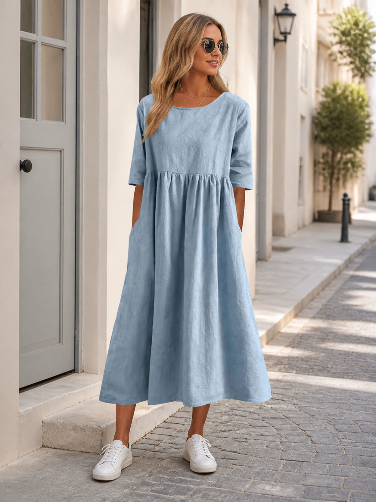 Long Loose-Fit Dress with a Round Neck and 7/8 Sleeves Costume Dresses detail