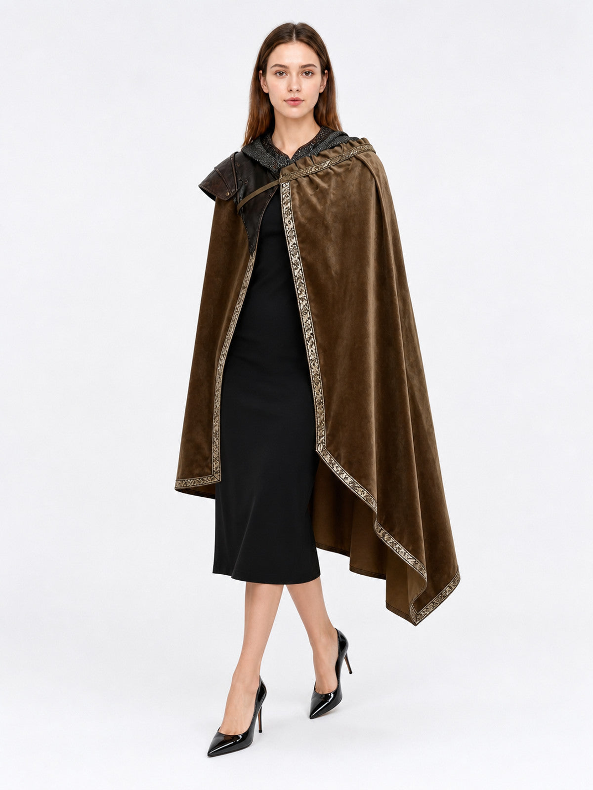 Brown asymmetrical cape with hood and decorative patterned edging, modeled from a three-quarter front view