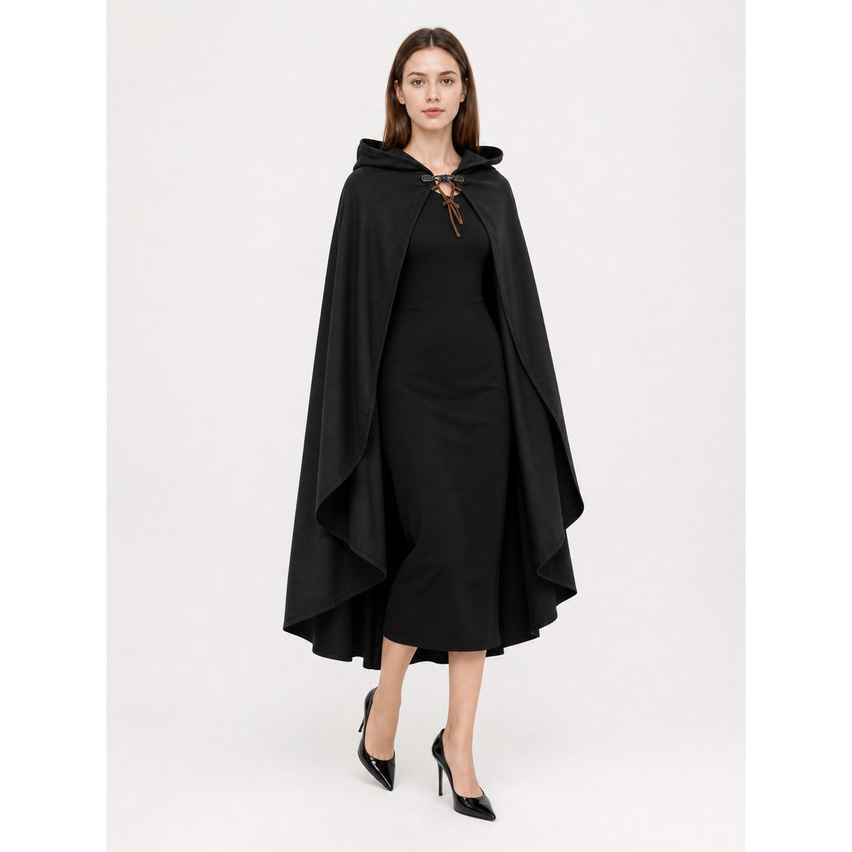 Black hooded cloak shown full-body over a black dress, with layered edges and a brown lace tie