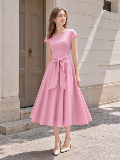 Pink dress in a solid color with short sleeves, a V-neckline, a fitted Costume Dresses detail