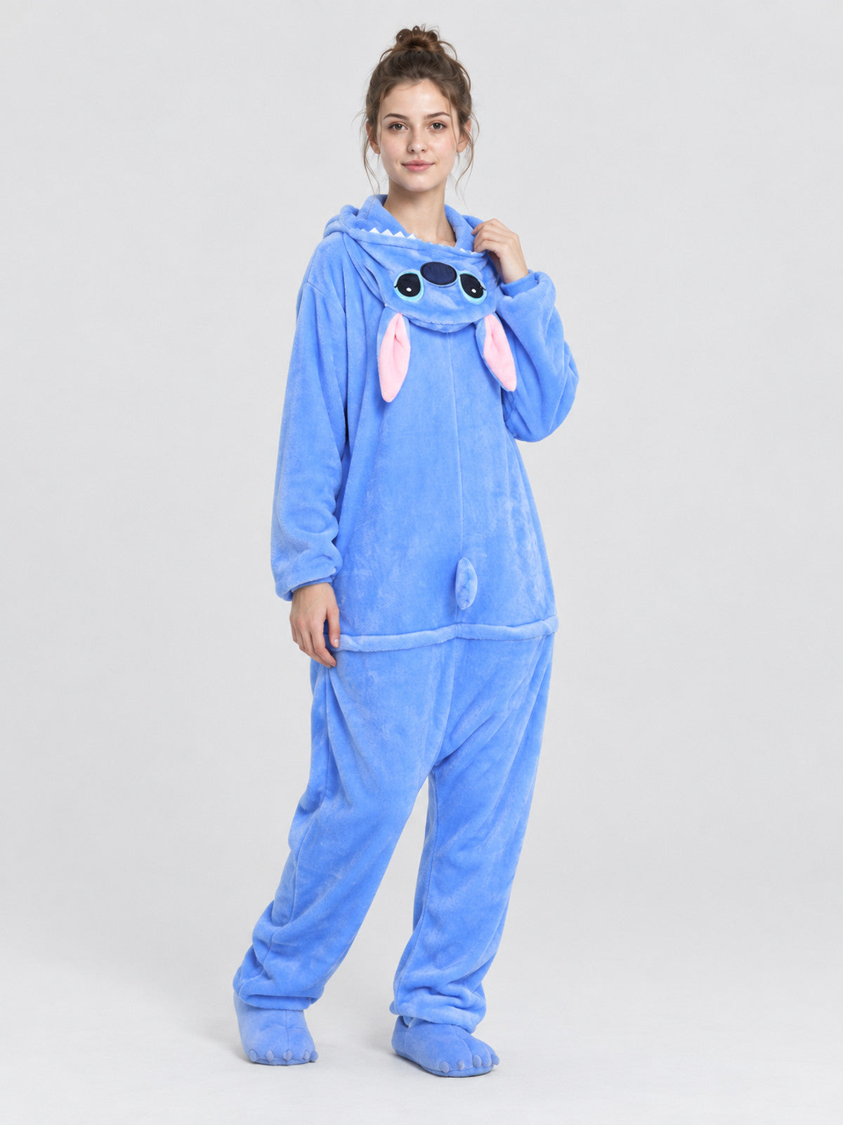 Blue pajama jumpsuit with a hood, ears, and tail
