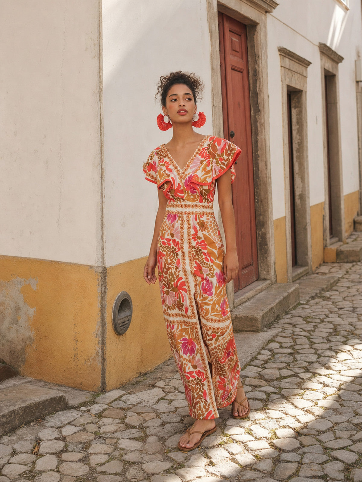 One-Piece Jumpsuit with a V-Neck, Short Sleeves, and Wide-Leg Pants. The garment product detail