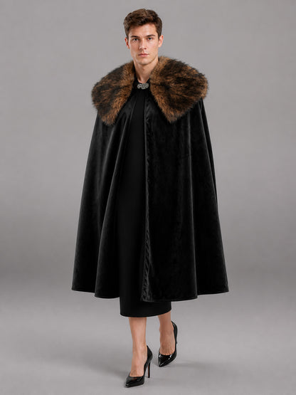 Black cape with a brown fur collar and front clasp, shown full-length on a male model in a gray studio