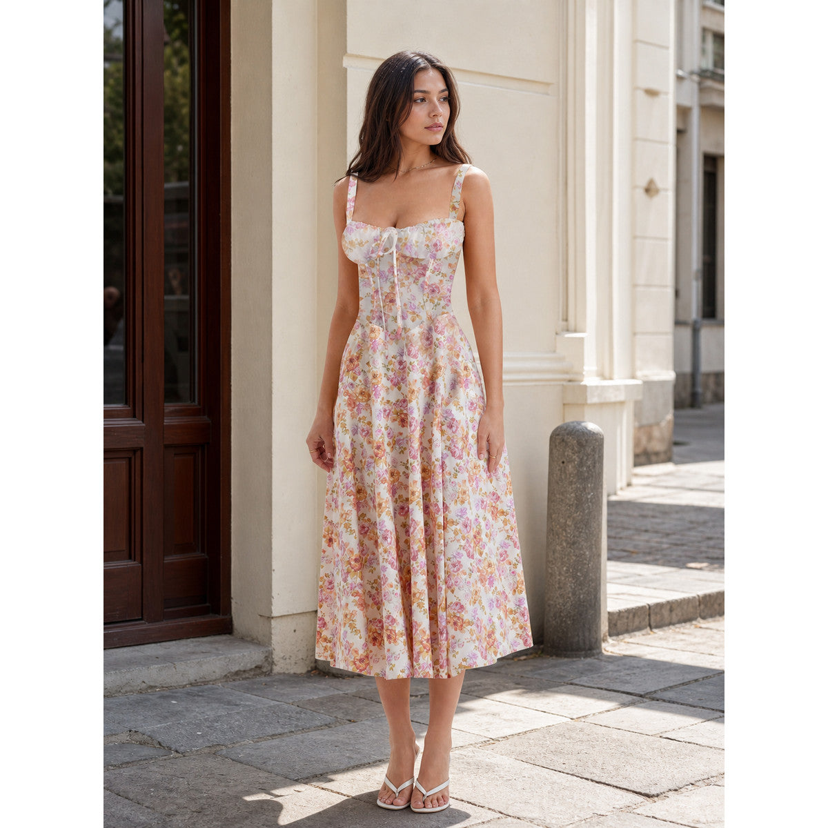 Women's midi dress with shoulder straps and floral print