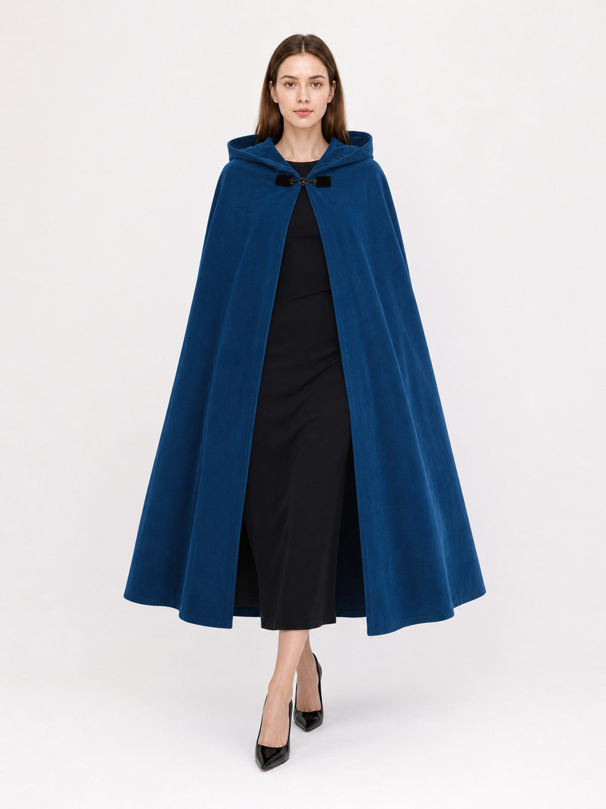 Blue hooded cloak with black clasp, shown full-body on a model with the hood resting behind her neck