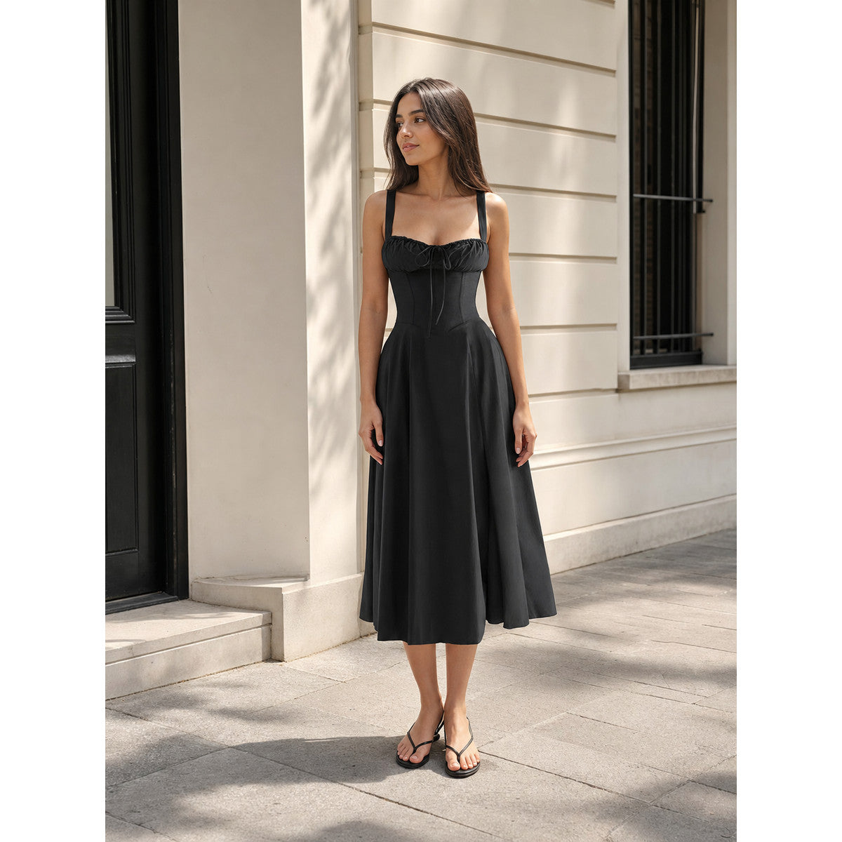 Black midi dress with spaghetti straps and a drawstring