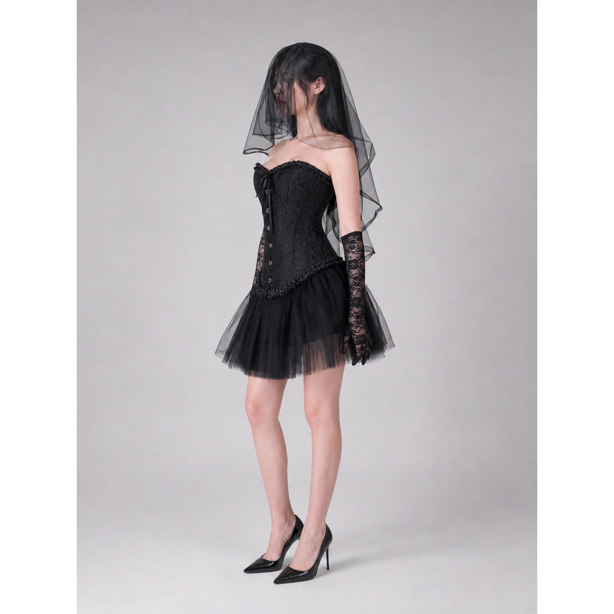 Gothic costume with corset, veil, and gloves lifestyle